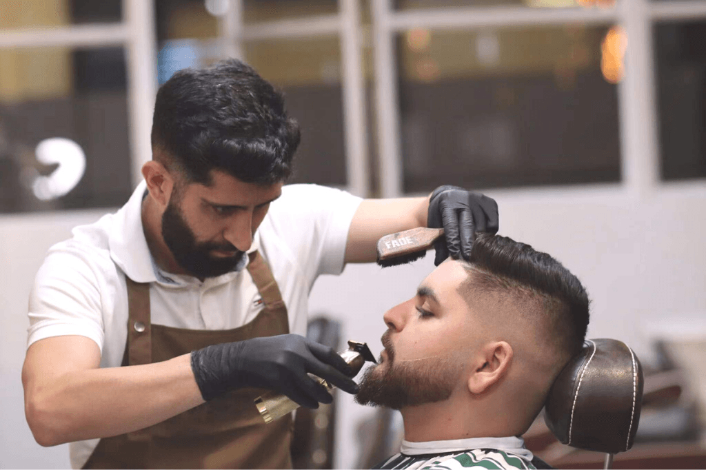 UPTOWN Barbers St James Arcade barbershop interior